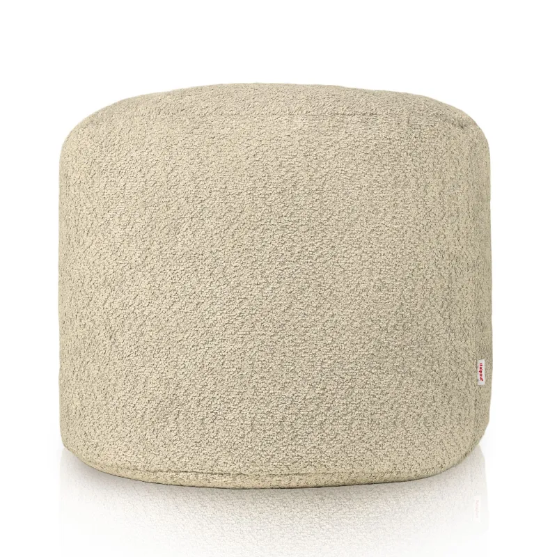 Practic puf cilindru bej, perfect pentru decorarea camerelor