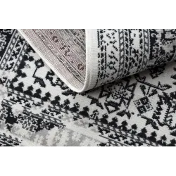 Covor vintage bej, moale și plăcut la atingere, perfect pentru dormitoare