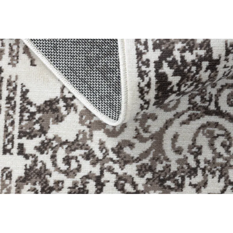 Covor vintage bej, ideal pentru utilizare în aer liber sau pe terase