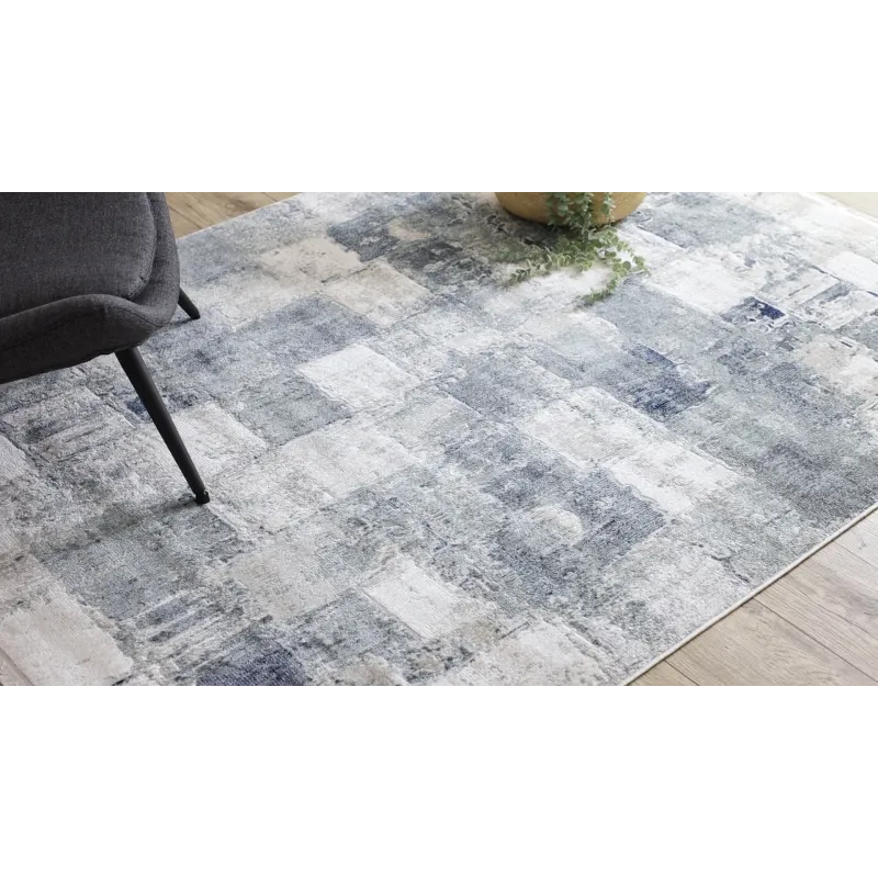Covor albastru stil vintage, ideal pentru interioare contemporane