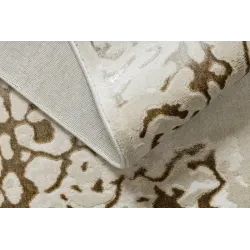 Covor modern pentru living, în nuanțe de crem și aur