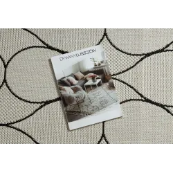 Covor elegant în nuanțe de crem și negru, ideal pentru living