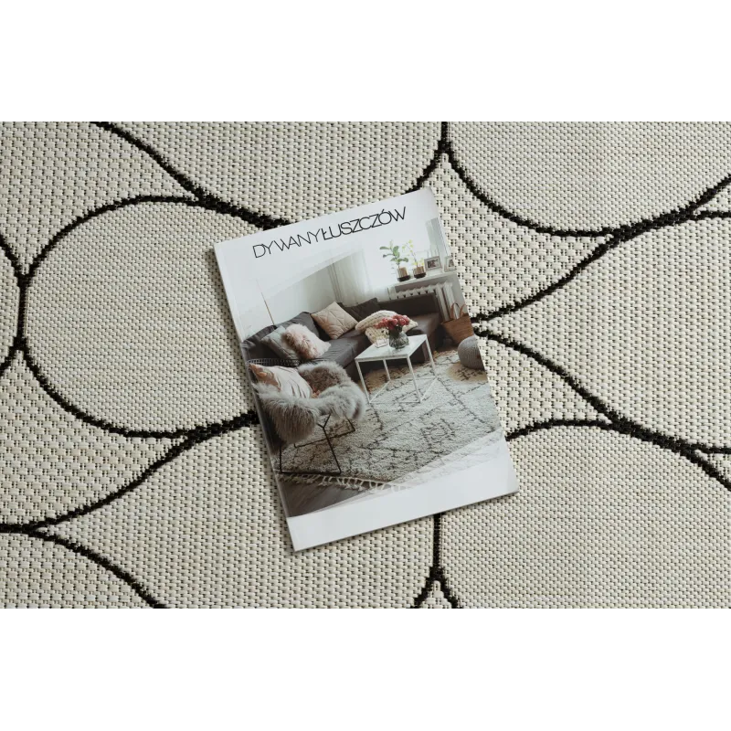 Covor elegant în nuanțe de crem și negru, ideal pentru living