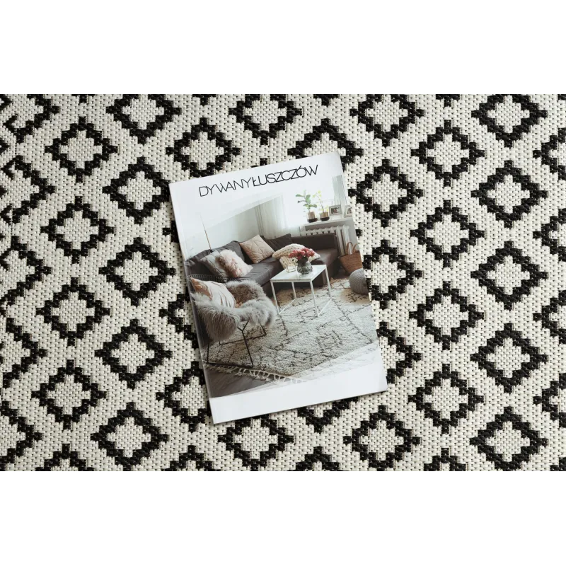 Covor elegant din sisal crem și negru, perfect pentru livingul modern