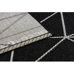 Covor din sisal texturat negru și argintiu, adăugând eleganță oricărui spațiu